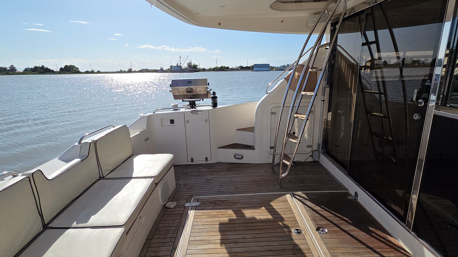 Summer Palace aft deck with BBQ and teak flooring