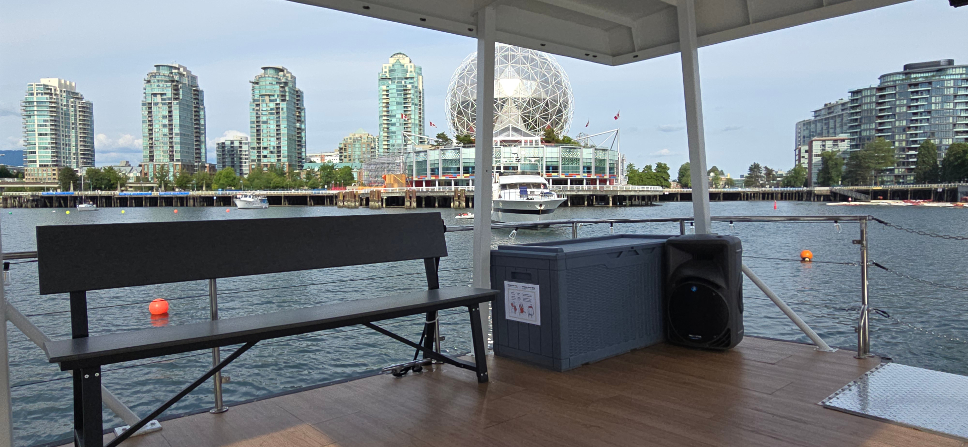 Shangri-La Joy aft deck bench with Science World and Vancouver skyline